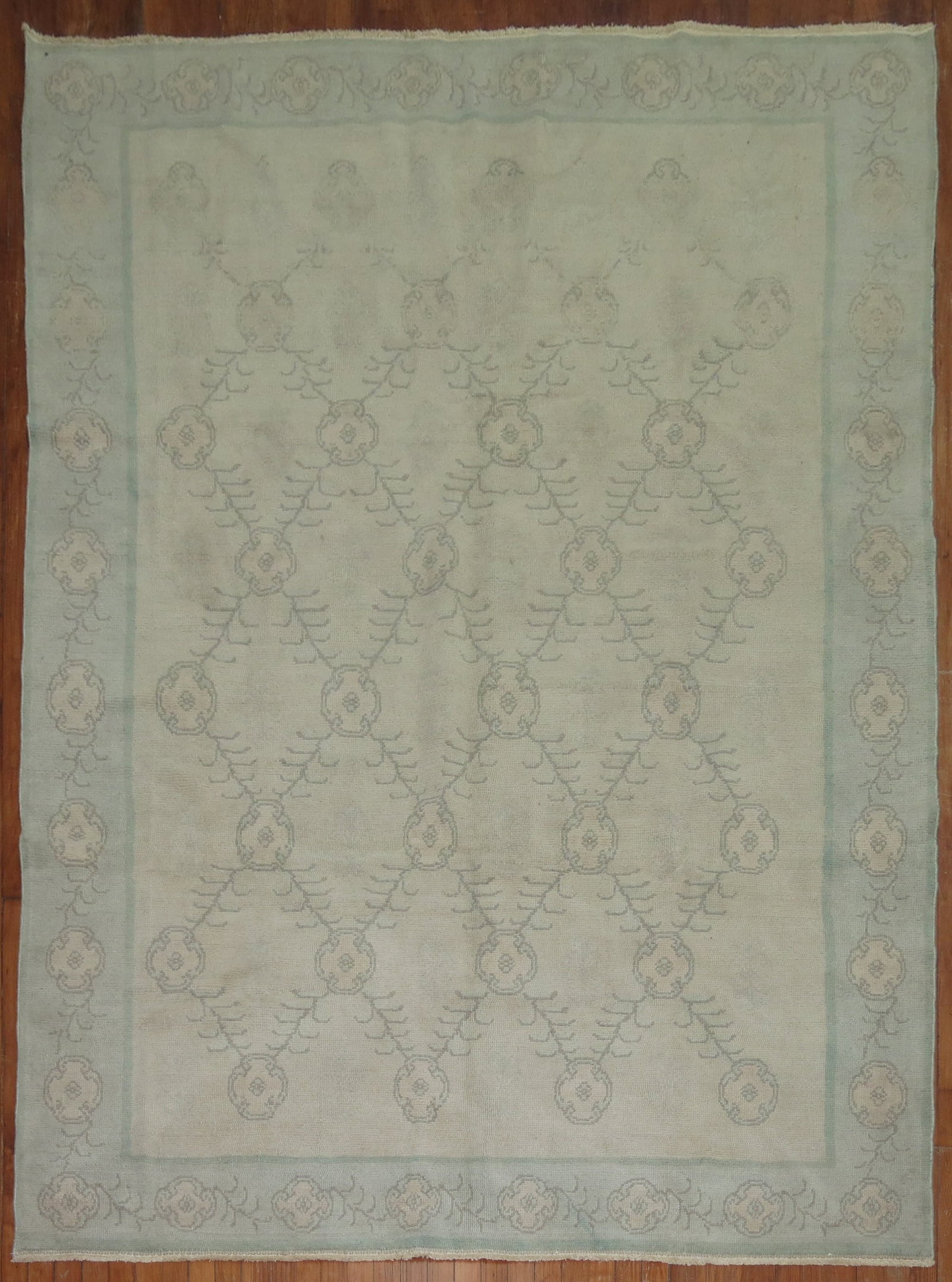 6' 7" x 9' 4" Mid 20th Century Turkish Konya Floral Rug: 6' 7" x 9' 4" Mid 20th Century Turkish Konya Floral Rug Vintage Turkish Konya rug with a floral design. This mid-20th century piece is pre-owned. Specifications Origin: Turkey Type: Konya Design: Flor