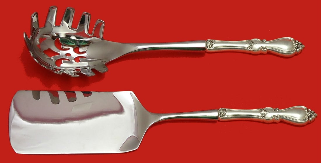Towle Queen Elizabeth I Sterling Silver 2pc Pasta Server Set: Towle Queen Elizabeth I Sterling Silver 2pc Pasta Server Set This exquisite Queen Elizabeth I pattern by Towle features a two-piece hostess set, perfect for serving pasta and lasagna. Crafted from hig