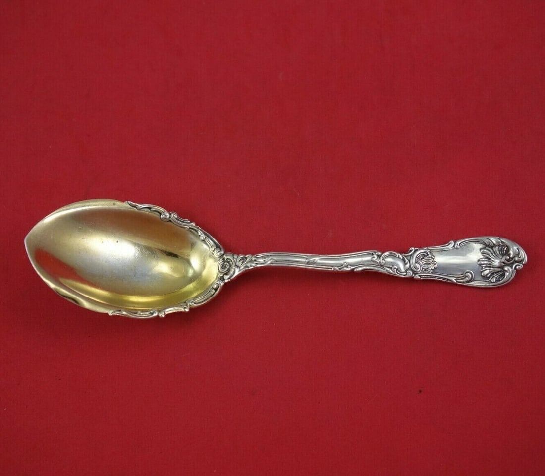 Gorham Hanover Sterling Silver Berry Spoon Gold Wash 8 3/4": Gorham Hanover Sterling Silver Berry Spoon Gold Wash 8 3/4" This exquisite Hanover Berry Spoon by Gorham is crafted from sterling silver and features a stunning gold wash finish. Measuring 8 3/4 inche