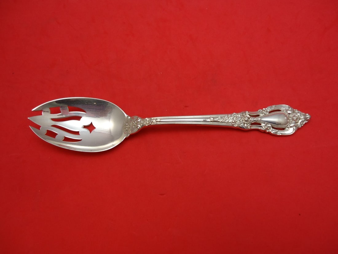 Lunt Eloquence Sterling Silver Slotted Serving Spoon 8.5": Lunt Eloquence Sterling Silver Slotted Serving Spoon 8.5" This exquisite serving spoon features a slotted design, crafted from high-quality sterling silver. It belongs to the Eloquence pattern by Lunt