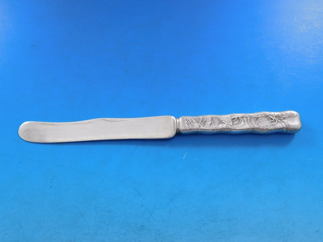 Tiffany Sterling Silver Lap Over Edge Acid Etched Dessert Knife 7.25": Tiffany Sterling Silver Lap Over Edge Acid Etched Dessert Knife 7.25" This exquisite dessert knife features the Lap Over Edge pattern by Tiffany & Co., crafted from high-quality sterling silver. The k
