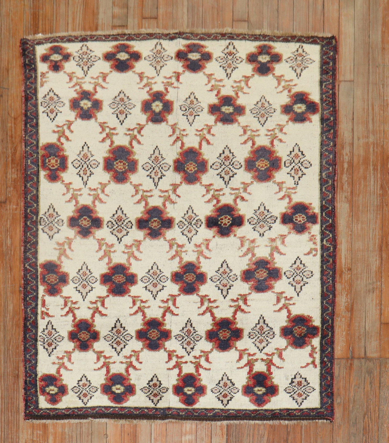 3' 11" x 4' 9" Turkish Konya Accent Rug: 3' 11" x 4' 9" Turkish Konya Accent Rug Mid-20th century Turkish Konya square rug with a traditional patterned design. This pre-owned accent rug is identified as a Konya type and offers a compact squa