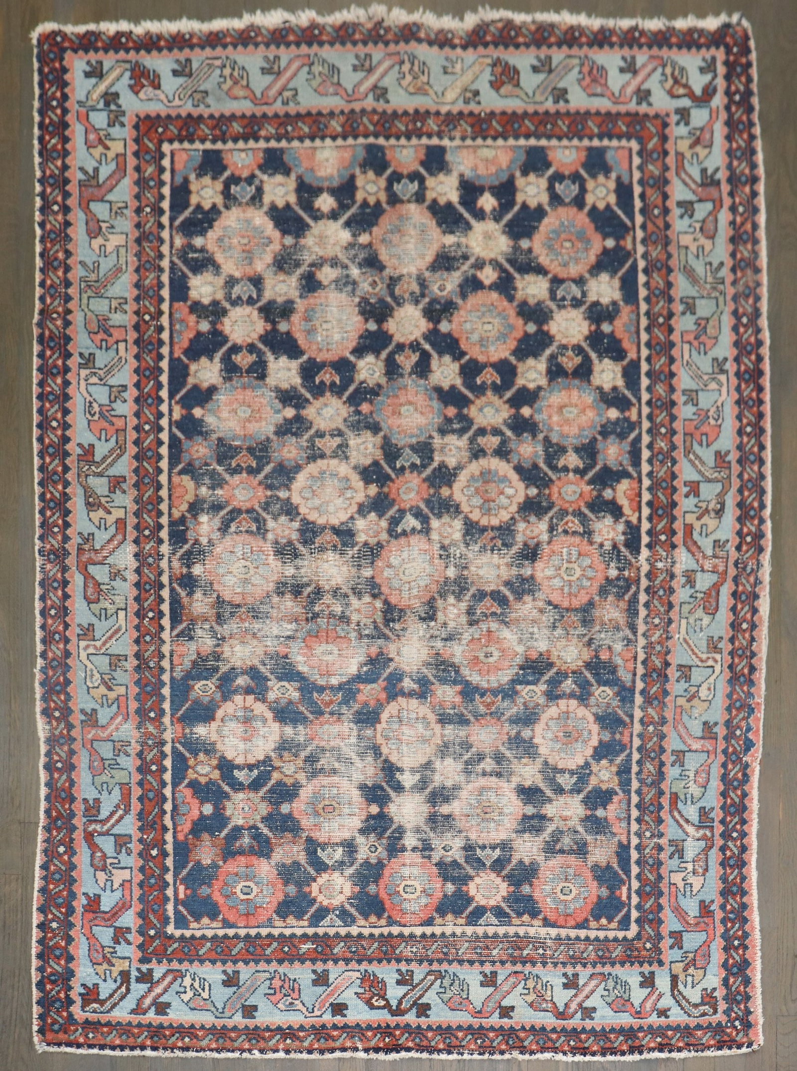 4' 4" x 6' 2" Persian Malayer Mini Khani Accent Rug: 4' 4" x 6' 2" Persian Malayer Mini Khani Accent Rug A pre-owned Persian Malayer rug from the 1920s featuring the Mini Khani pattern. This accent rug has a worn, shabby chic appearance that reflects it