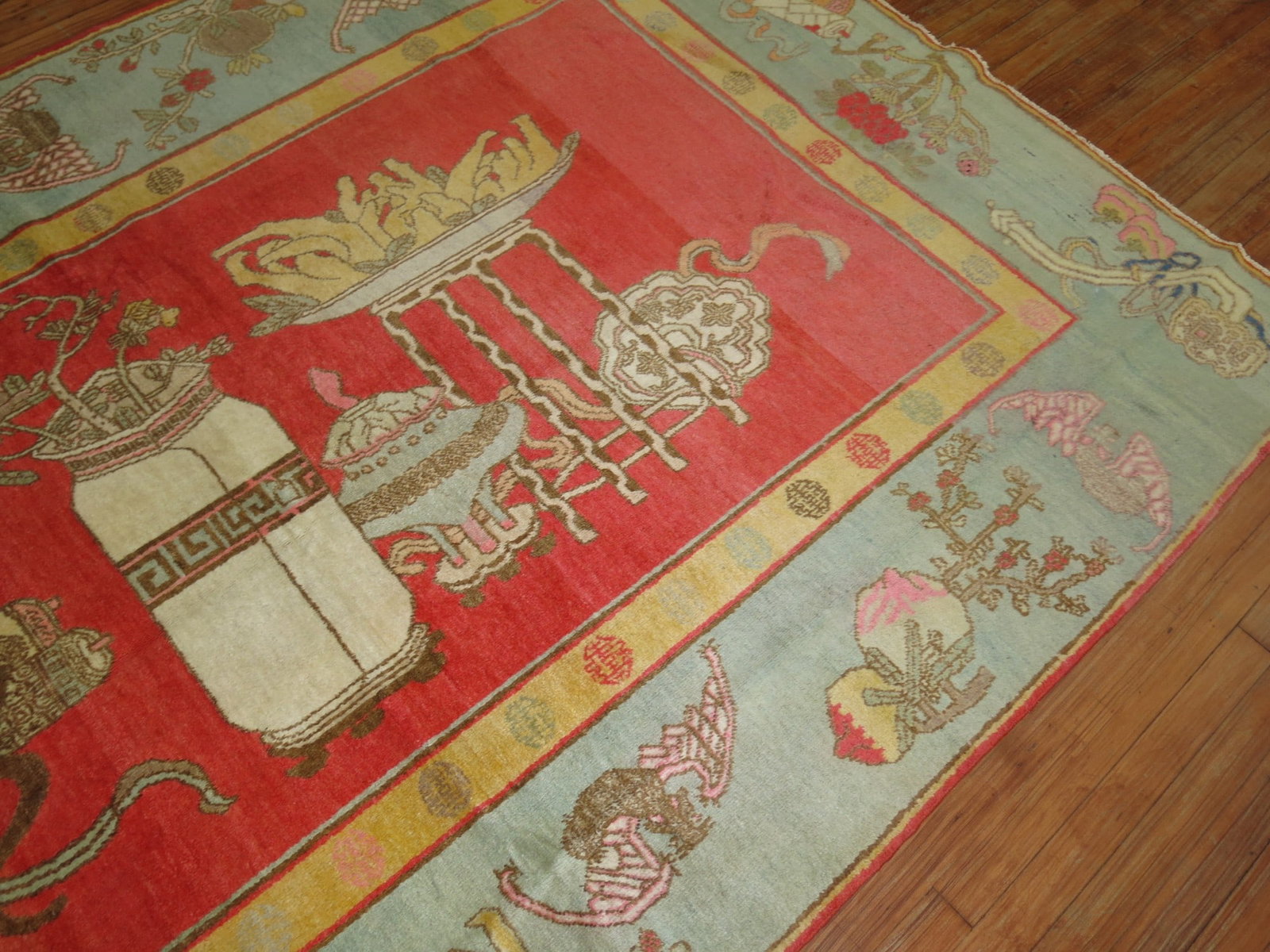 5' 11" x 9' 7" Early 20th Century Khotan Rug: 5' 11" x 9' 7" Early 20th Century Khotan Rug An early 20th century Khotan Samarkand rug with a classic antique presentation. This pre-owned rug is identified as a Khotan type. Specifications Title: An