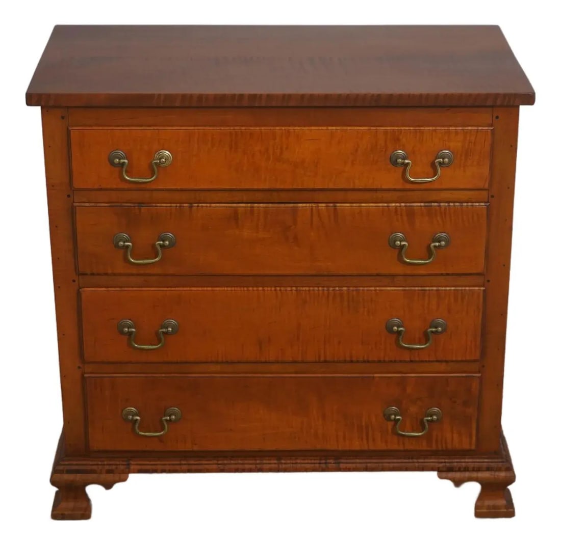 Tiger Maple Bachelor Chest with 4 Drawers: Tiger Maple Bachelor Chest with 4 Drawers This vintage bench-made bachelor chest, crafted from solid tiger maple, features four drawers with hand-dovetailed construction, exemplifying high-quality cra