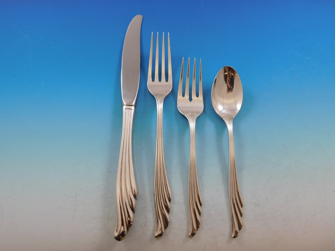 Wallace Caribbean Sterling Silver 4-Piece Place Setting: Wallace Caribbean Sterling Silver 4-Piece Place Setting This exquisite 4-piece place setting from the Caribbean pattern by Wallace is crafted from high-quality sterling silver, showcasing timeless ele