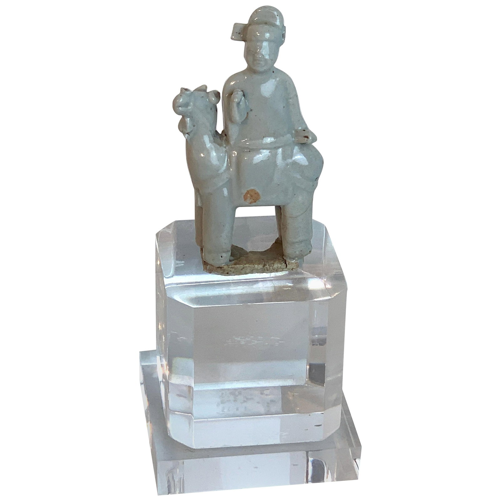 Song Dynasty Celadon Porcelain Horse and Rider Set with Lucite Base: Song Dynasty Celadon Porcelain Horse and Rider Set with Lucite Base This exquisite set features a Song Dynasty Chinese celadon porcelain horse and rider, crafted during the 10th to 13th century AD. Th
