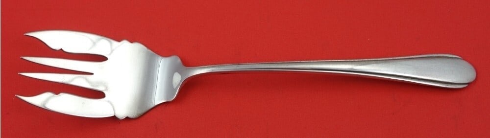 Weidlich Fiancee Sterling Silver Cold Meat Fork 8 3/8": Weidlich Fiancee Sterling Silver Cold Meat Fork 8 3/8" This exquisite cold meat fork from the Fiancee pattern by Weidlich showcases the elegance of sterling silver craftsmanship. Measuring 8 3/8 inche