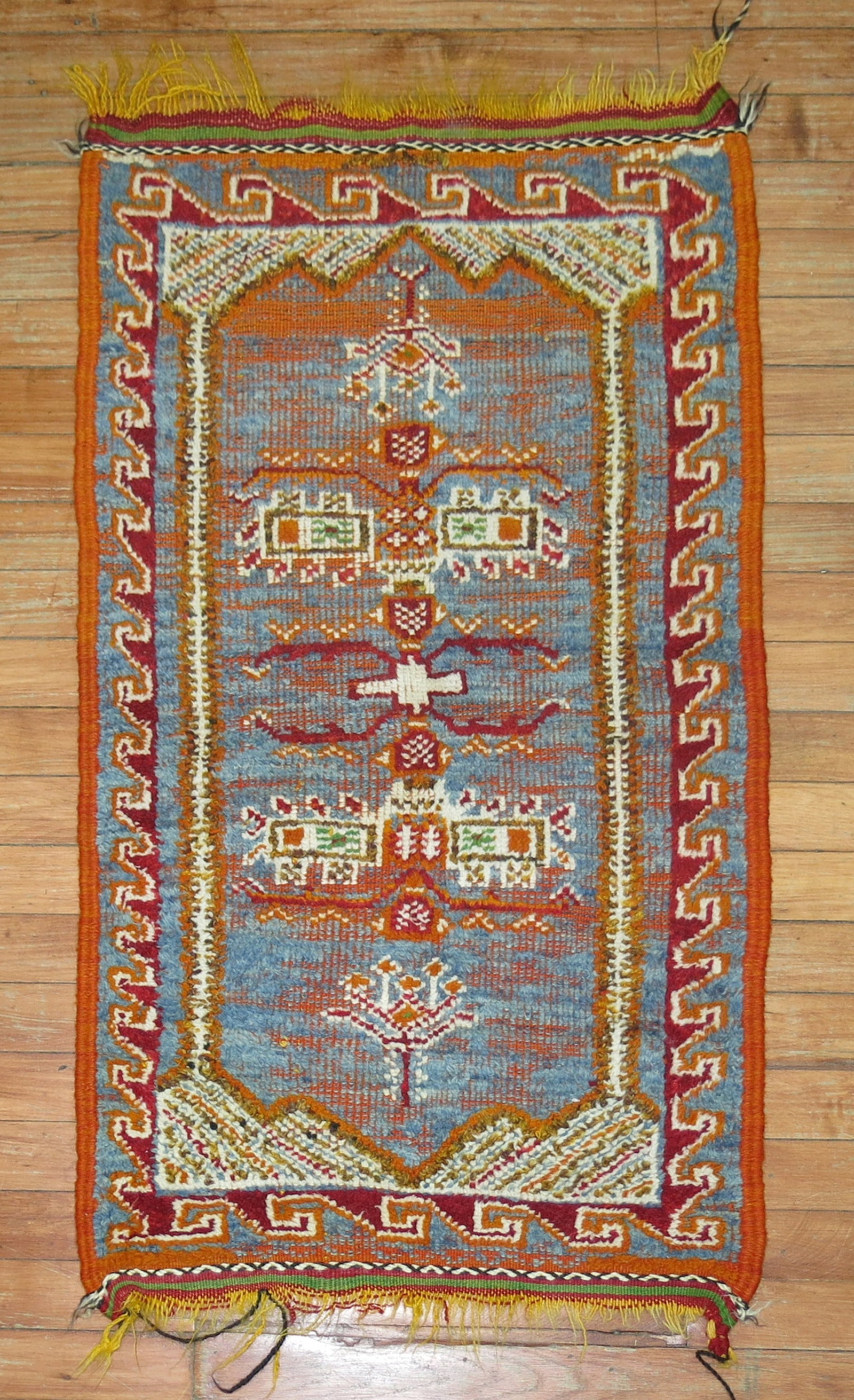 2' x 3' 4" Moroccan Yastik Rug in Blue and Orange: 2' x 3' 4" Moroccan Yastik Rug in Blue and Orange 20th century Moroccan rug in blue and orange with geometric patterning. This pre-owned small rug is categorized as a yastik. Specifications Title: Blu