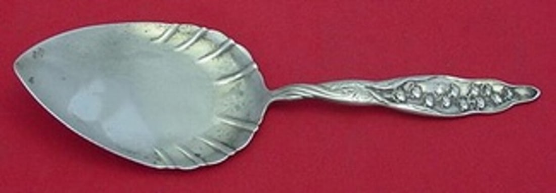 Whiting Sterling Silver 9" Lily of the Valley Pie Server: Whiting Sterling Silver 9" Lily of the Valley Pie Server This exquisite pie server from the renowned Whiting company showcases the elegant "Lily of the Valley" pattern, which was patented in 1885. Cra
