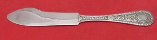 Whiting Laureate All-Sterling 7 1/8 Inch Fish Knife: Whiting Laureate All-Sterling 7 1/8 Inch Fish Knife This exquisite fish knife is part of the Laureate pattern by Whiting, crafted from all-sterling silver. Featuring a flat handle design, it measures 