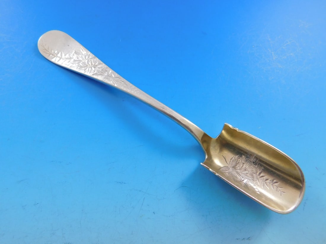 Brite-Cut Sterling Silver Cheese Scoop Goldwashed Floral Design 7 Inches: Brite-Cut Sterling Silver Cheese Scoop Goldwashed Floral Design 7 Inches This exquisite cheese scoop features a beautifully crafted Brite-Cut design and is made of sterling silver with a goldwashed fl