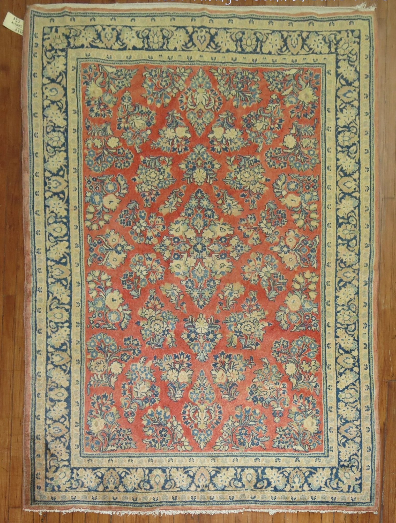 5' 4" x 8' Persian Sarouk floral area rug: 5' 4" x 8' Persian Sarouk floral area rug Vintage Persian Sarouk floral rug from the mid 20th century. This pre-owned area rug features an intricate floral design consistent with the Sarouk type. Spec