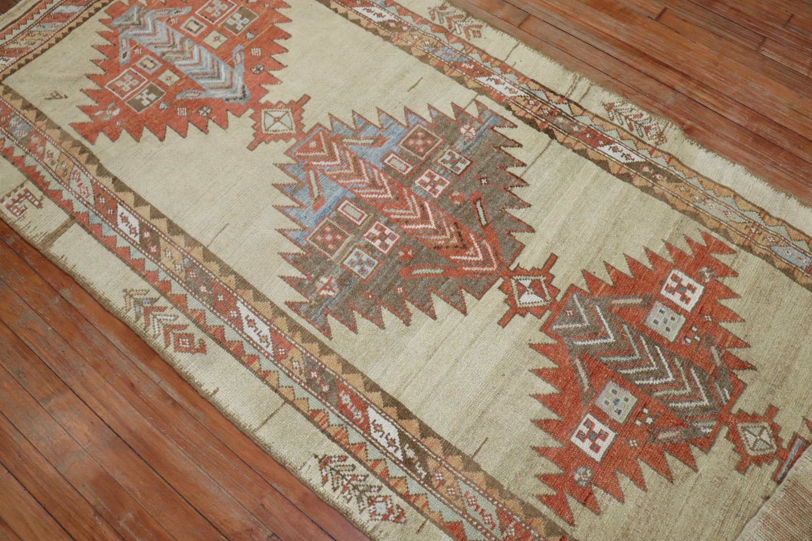 3' 7" x 8' 9" Persian Serab wide runner camel field: 3' 7" x 8' 9" Persian Serab wide runner camel field Early 20th century Persian Serab wide runner with a high decorative design and a camel-toned field accented by soft brown, rust, and light blue. Spe