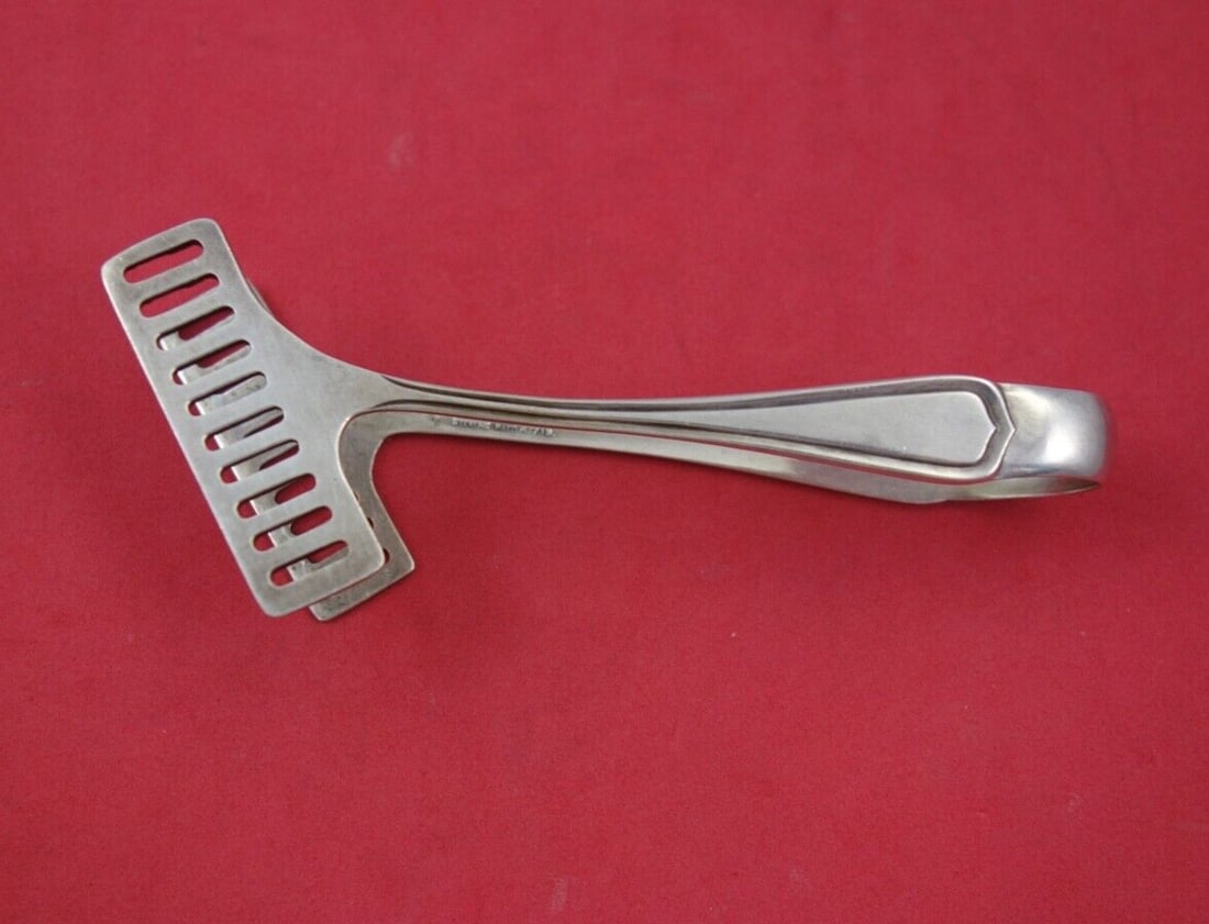 Carolina by Lunt Sterling Silver Asparagus Tong 4 1/8" Serving Piece: Carolina by Lunt Sterling Silver Asparagus Tong 4 1/8" Serving Piece Introducing the Carolina by Lunt Sterling Silver Asparagus Tong, an exquisite serving piece perfect for your dining experience. Cra