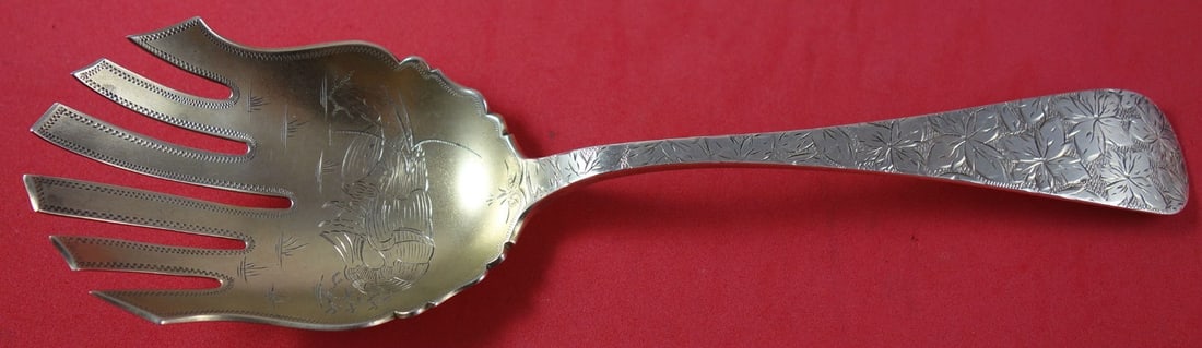 Seymour Woodbine Engraved Gold-Washed Sterling Silver Serving Fork 8 3/4": Seymour Woodbine Engraved Gold-Washed Sterling Silver Serving Fork 8 3/4" This exquisite serving fork features the elegant Woodbine Engraved pattern by Seymour. Crafted from high-quality sterling silv