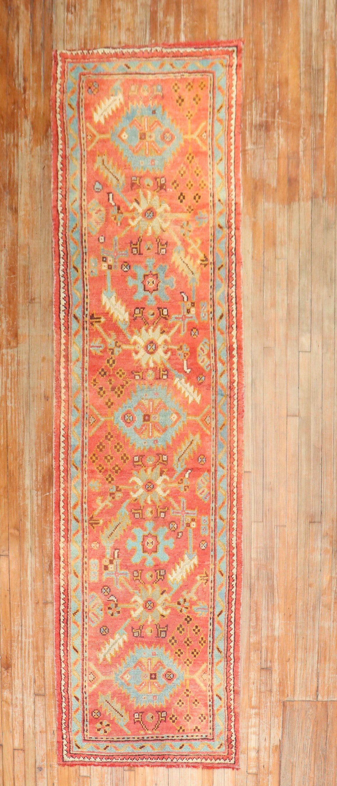 3' 1" x 11' 9" Antique Oushak Runner in Orange: 3' 1" x 11' 9" Antique Oushak Runner in Orange Antique Turkish Oushak runner from the 1900s in an orange colorway. This pre-owned piece is categorized as a runner and identified as an Oushak rug. Spec
