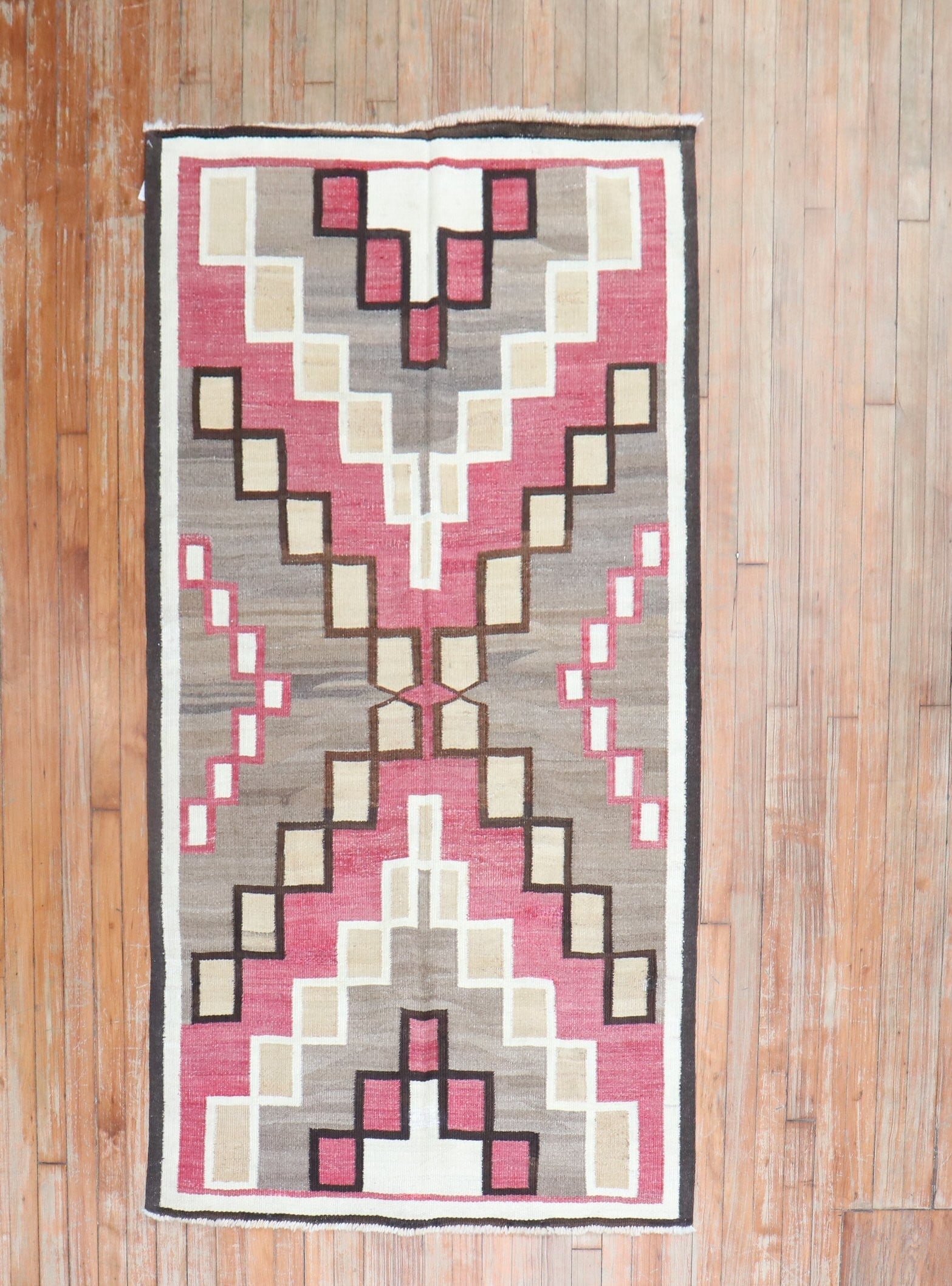 3' 5" x 6' 2" Small American Navajo Rug: 3' 5" x 6' 2" Small American Navajo Rug Early 20th century American Navajo scatter rug in a small size. This pre-owned woven rug features a geometric pattern. Specifications Item Type: Scatter rug Sty