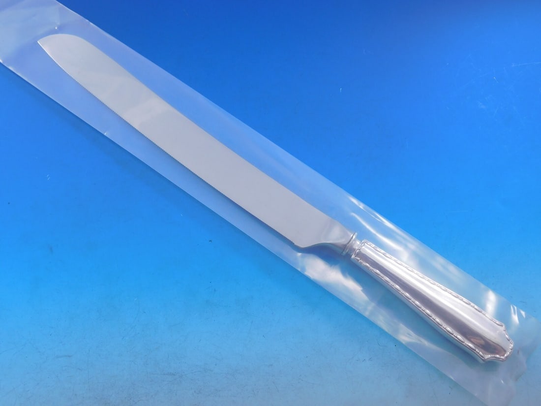 Tiffany Co Marquise Sterling Silver Wedding Cake Knife 12in Hollow Handle: Tiffany Co Marquise Sterling Silver Wedding Cake Knife 12in Hollow Handle Marquise by Tiffany & Co. wedding cake knife with a custom-made hollow handle and stainless implement. The piece is made of st