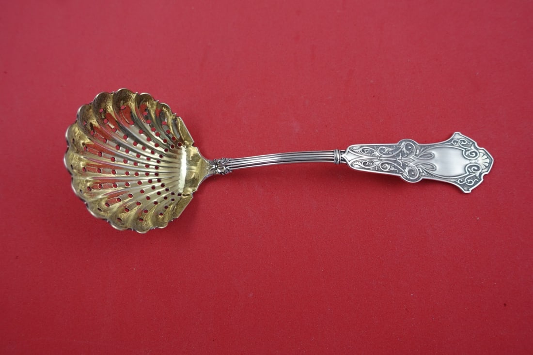 Whiting Alhambra Sterling Silver Sugar Sifter Ladle Shell Bowl: Whiting Alhambra Sterling Silver Sugar Sifter Ladle Shell Bowl This exquisite Sterling Silver Sugar Sifter Ladle, crafted by Whiting in the elegant Alhambra pattern, features a beautifully designed sh