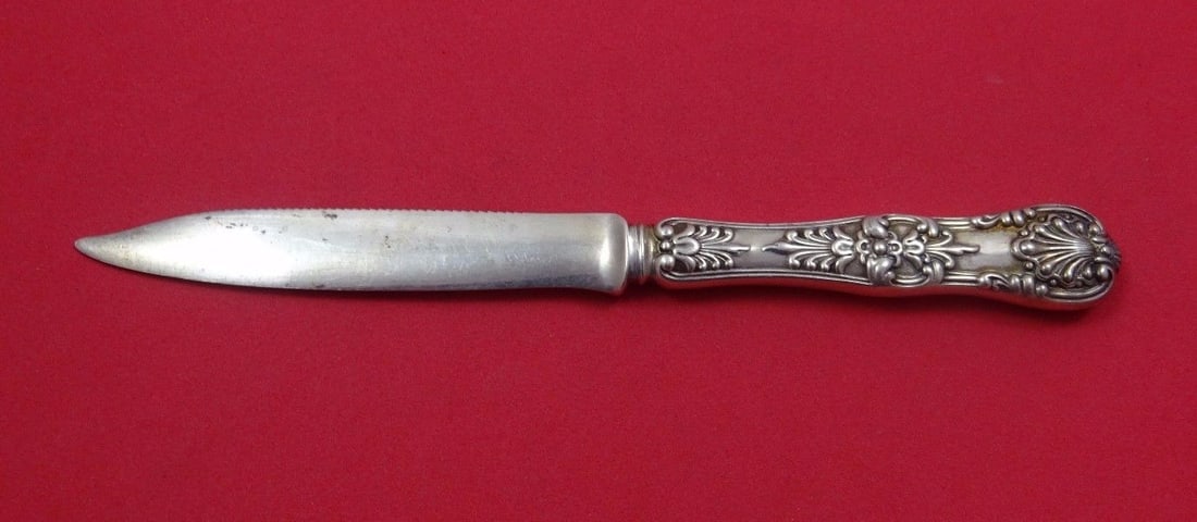 Tiffany & Co English King Sterling Silver Serrated Fruit Knife 7": Tiffany & Co English King Sterling Silver Serrated Fruit Knife 7" This exquisite English King fruit knife by Tiffany & Co. showcases the elegance of sterling silver craftsmanship. Designed with a holl