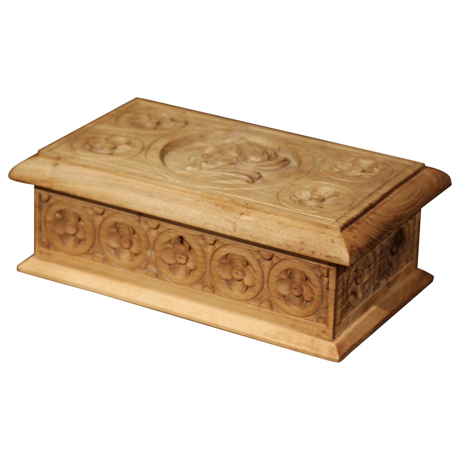 Art Deco Breton chestnut box by E Bayon: Art Deco Breton chestnut box by E Bayon This early 20th century French Breton box is crafted from chestnut wood and features intricate hand-carved details on all sides. The hinged lid is adorned with 