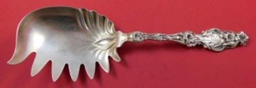 Whiting Lily Sterling Silver 9 1/4 Macaroni Serving Server: Whiting Lily Sterling Silver 9 1/4 Macaroni Serving Server Sterling silver macaroni server in the Lily pattern by Whiting. This serving piece measures 9 1/4 inches and is monogrammed. It is described 