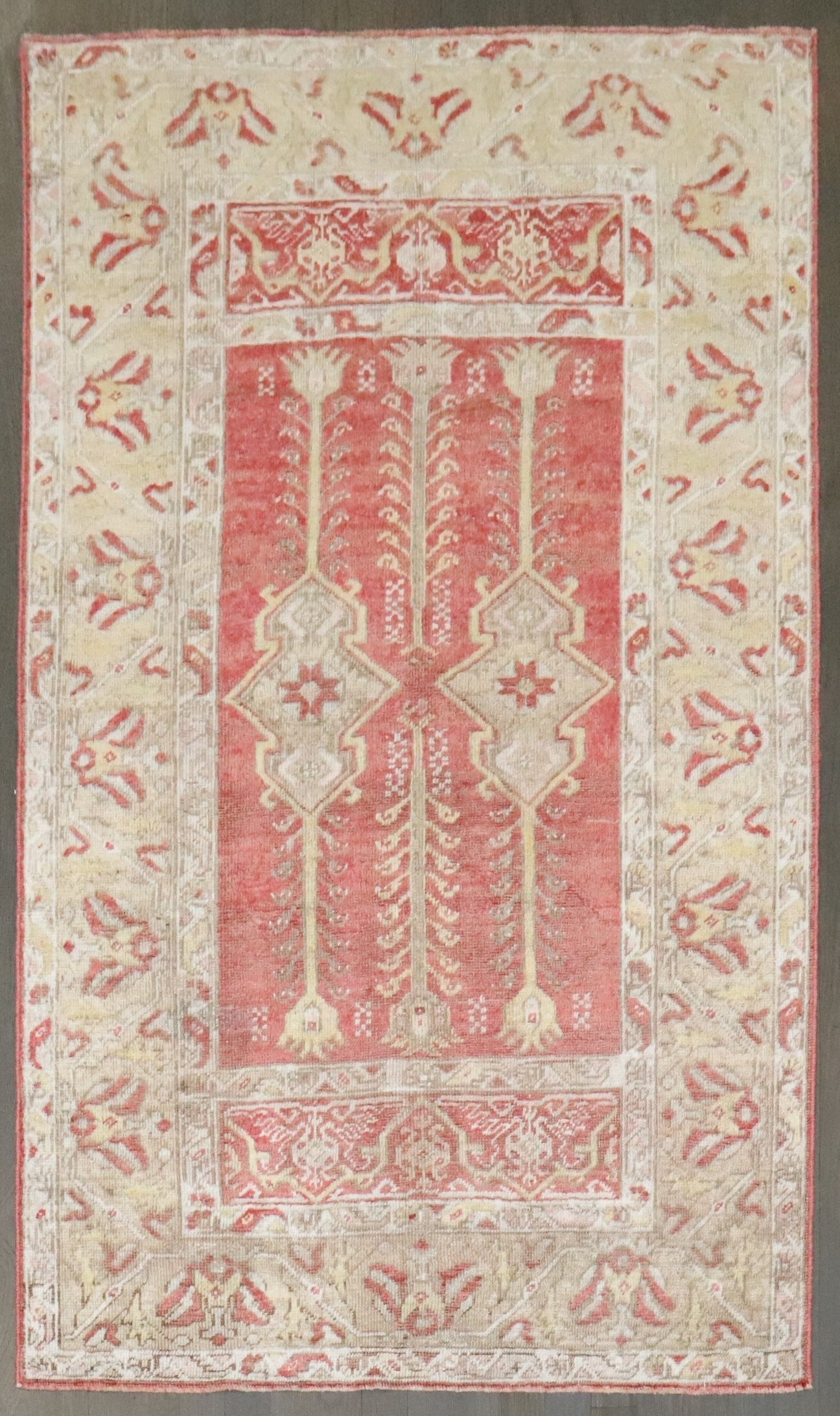 3' 3" x 5' 6" Turkish Mudjur Prayer Rug: 3' 3" x 5' 6" Turkish Mudjur Prayer Rug Early 20th-century Turkish Mudjur prayer rug in a small format. This pre-owned piece is identified as a Mudjur prayer rug and retains its original antique chara
