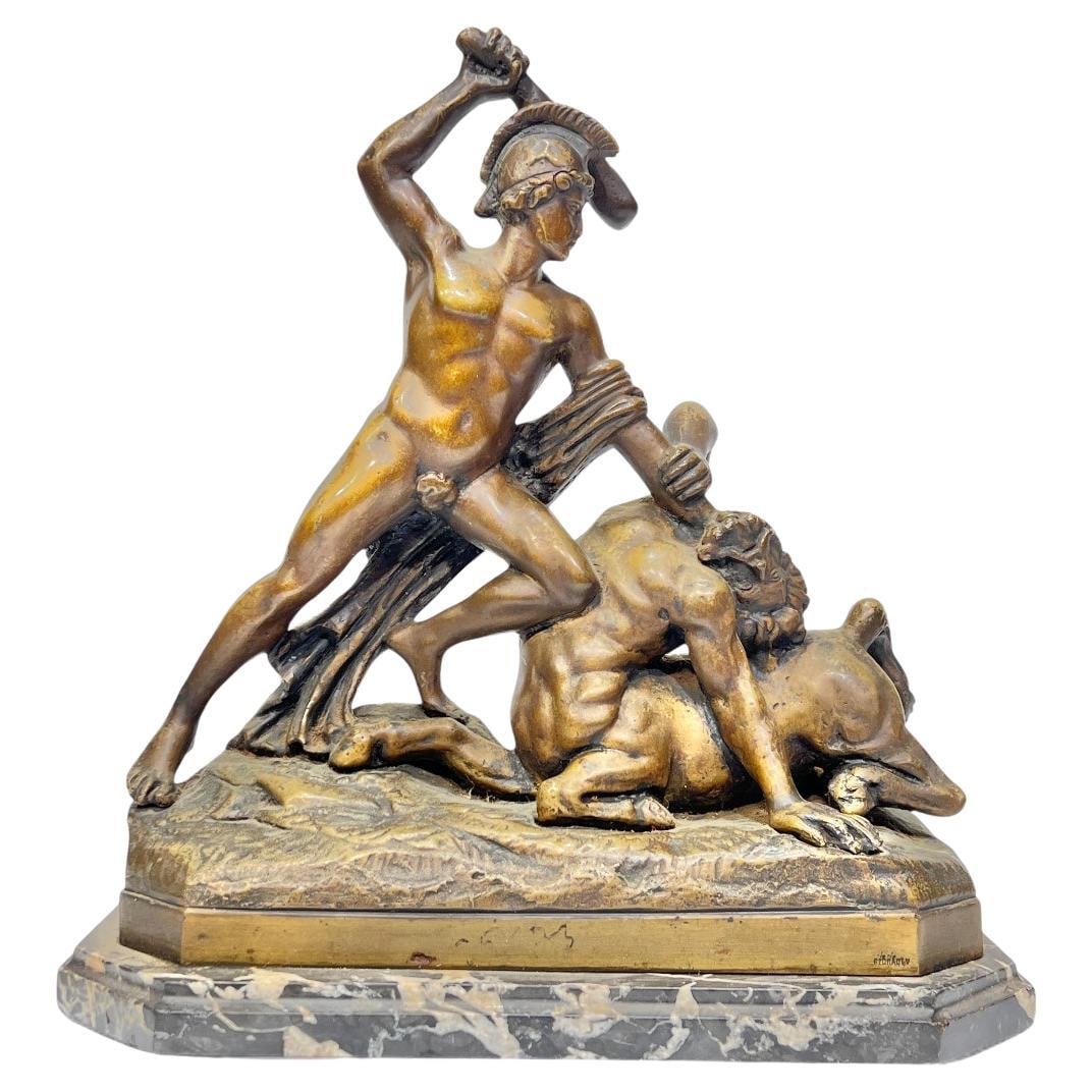 19th Century Bronze Marble Grand Tour Theseus and Minotaur Sculpture: 19th Century Bronze Marble Grand Tour Theseus and Minotaur Sculpture This antique Grand Tour bronze sculpture, crafted circa 1900, portrays the dramatic Greek mythological scene of Theseus slaying the