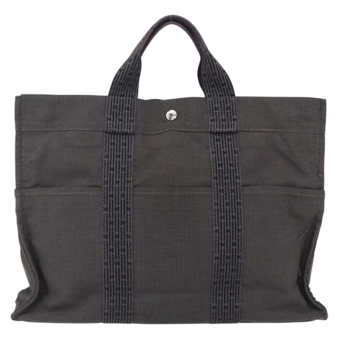Hermes Fourre-tout Herline Canvas Tote Bag Gray 43cm by 32cm: Hermes Fourre-tout Herline Canvas Tote Bag Gray 43cm by 32cm This pre-owned Hermes Fourre-tout Herline handbag for women features a gray canvas exterior with a spacious design. It shows signs of use i