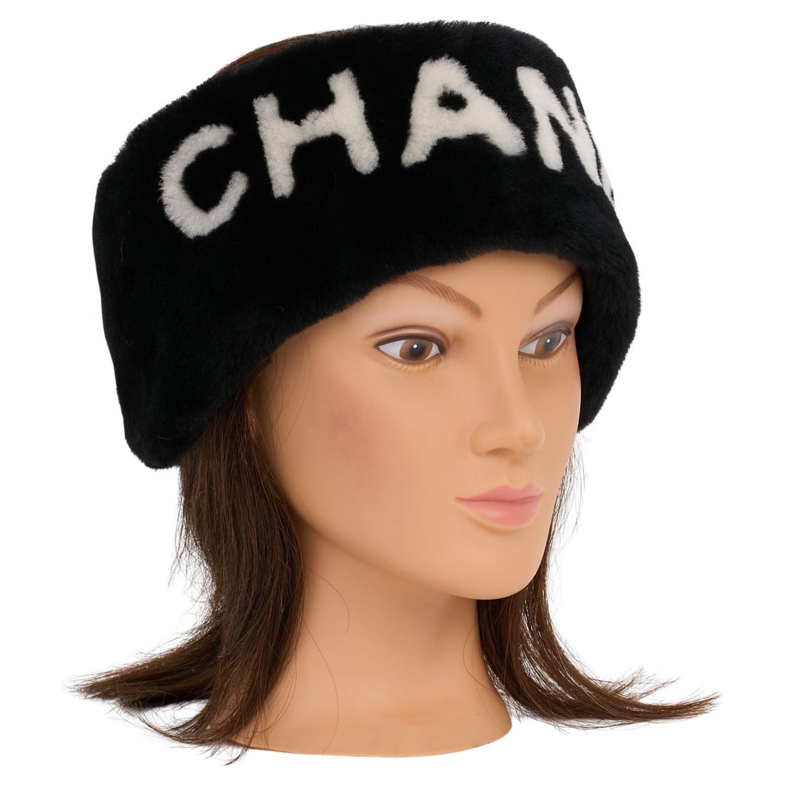 Chanel Black Shearling Headband with White Logo Made in Italy: Chanel Black Shearling Headband with White Logo Made in Italy This Chanel headband is a stylish accessory made from luxurious black shearling. It features the iconic white Chanel logo text prominently