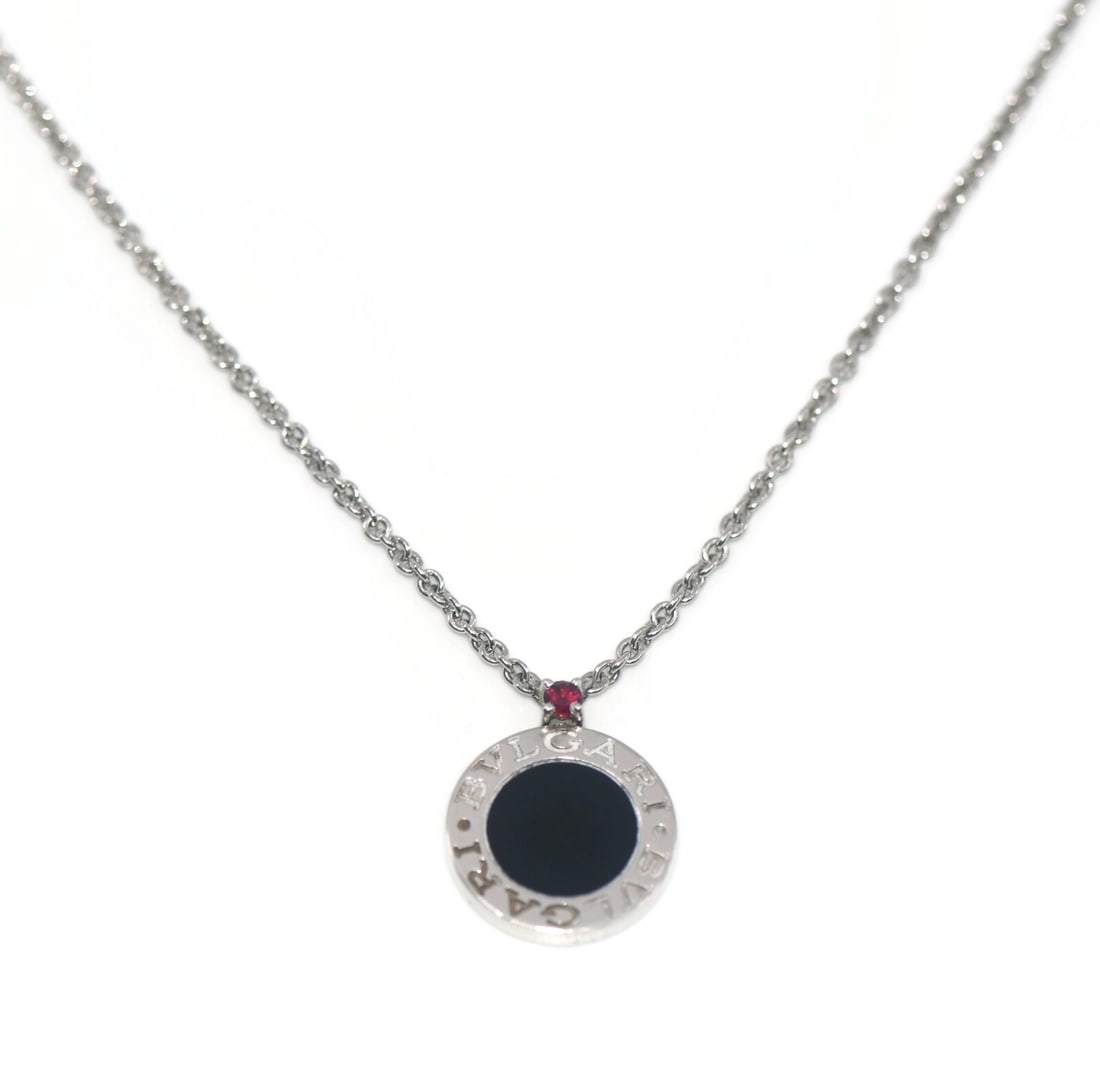 Bvlgari Save The Children Sterling Silver Pendant Necklace with Onyx: Bvlgari Save The Children Sterling Silver Pendant Necklace with Onyx This exquisite necklace from Bvlgari's Save the Children collection showcases a stunning pendant crafted from high-quality sterling