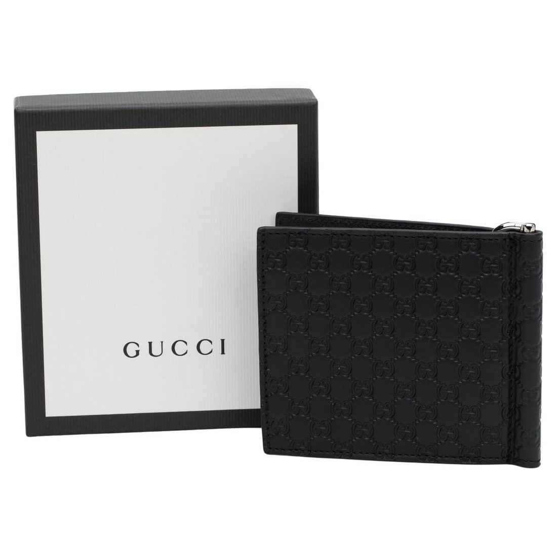 Gucci Black Guccissima Leather Wallet with Money Clip and Box: Gucci Black Guccissima Leather Wallet with Money Clip and Box This Gucci wallet showcases a sophisticated design in black guccissima print leather. It features a center money clip and offers six slots