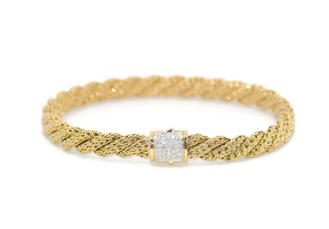18k Yellow Gold Chain Bracelet with Diamonds by John Hardy: 18k Yellow Gold Chain Bracelet with Diamonds by John Hardy This bracelet by John Hardy features an elegant chain design crafted from 18k yellow gold and is accented with diamonds. The piece measures 7