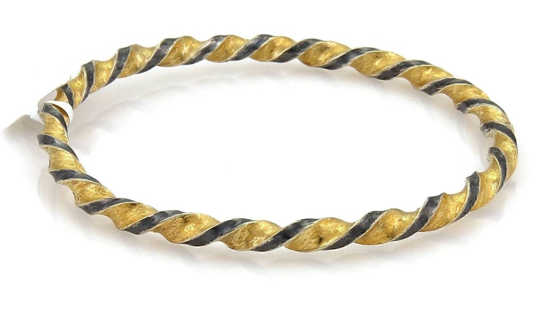 Gurhan Midnight twisted bangle bracelet sterling silver and 24k gold 7.25": Gurhan Midnight twisted bangle bracelet sterling silver and 24k gold 7.25" Pre-owned Gurhan Midnight twisted bangle bracelet, handcrafted in sterling silver and 24k gold. This signed mixed-metal desig