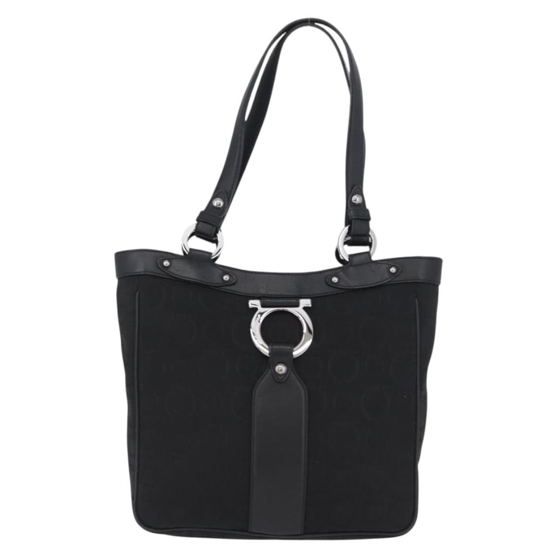 Black Canvas Tote Bag Salvatore Ferragamo Vintage: Black Canvas Tote Bag Salvatore Ferragamo Vintage This Salvatore Ferragamo vintage tote bag for women features black canvas material with leather accents. It presents slight rubbing on the surface, le