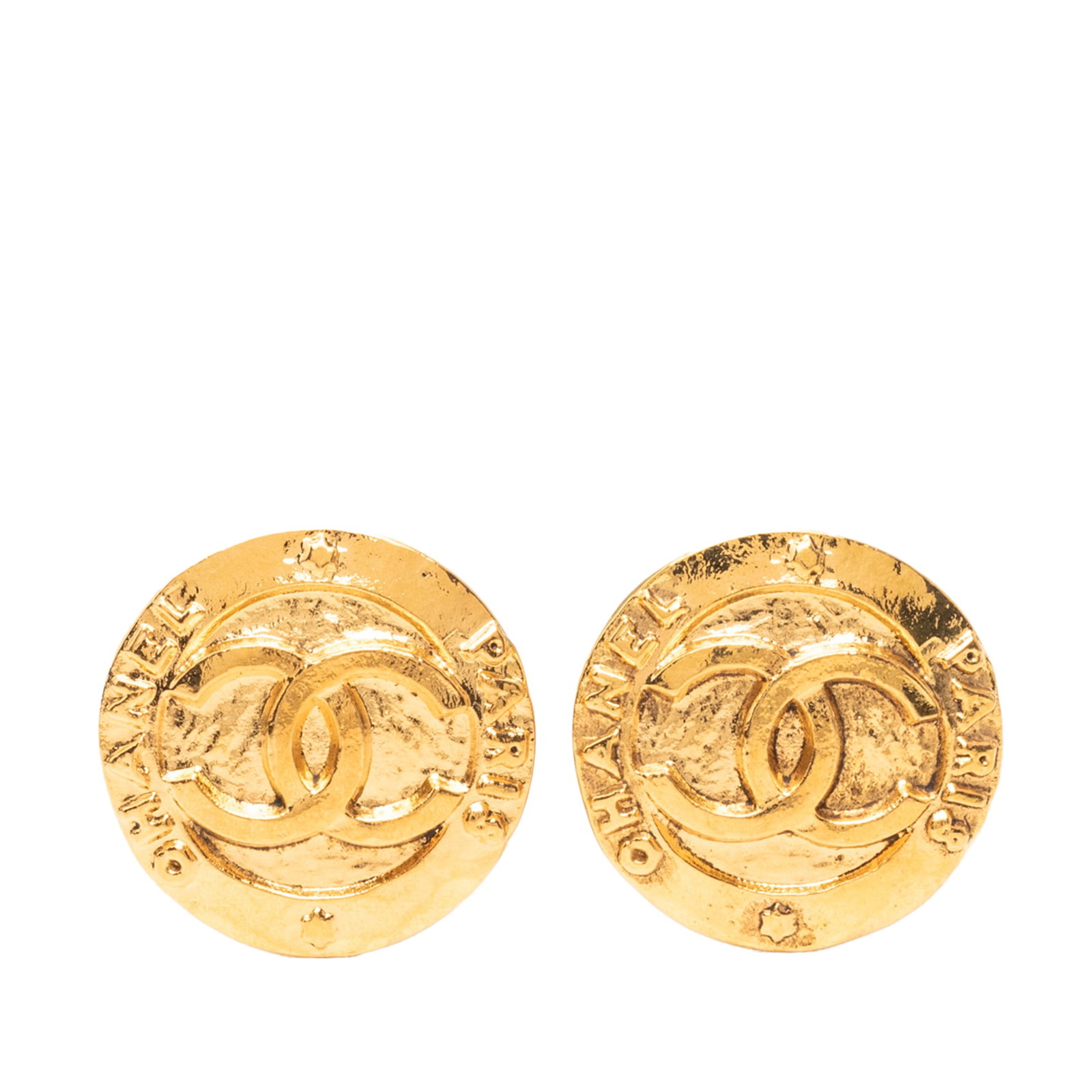 Chanel CC Round Clip On Earrings Gold Plated Metal: Chanel CC Round Clip On Earrings Gold Plated Metal Round Chanel CC clip-on earrings with a gold-plated metal body. This costume jewelry pair is made in France and shows scratched wear to the front, ba