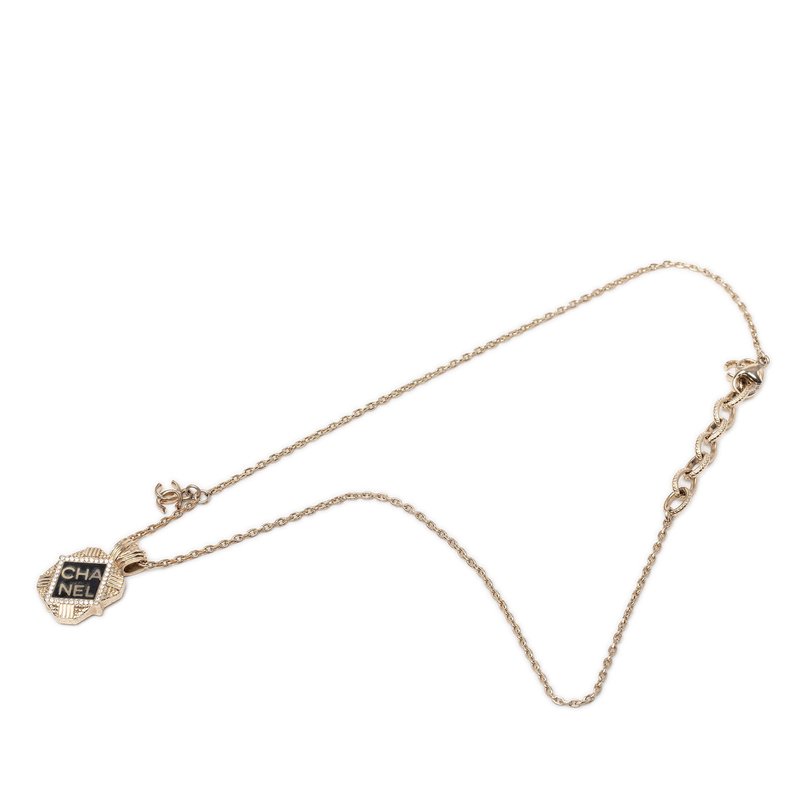 Chanel Strass Enamel Pendant Necklace Gold Plated: Chanel Strass Enamel Pendant Necklace Gold Plated Chanel pendant necklace featuring a gold plated metal body, an enamel pendant, and crystal embellishments. It is finished with a lobster clasp closure