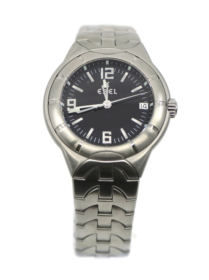 EBEL Type E Quartz Watch E9187C41 38mm Stainless Steel with Box and Papers: EBEL Type E Quartz Watch E9187C41 38mm Stainless Steel with Box and Papers The Ebel Type E Stainless Steel Watch E9187C41 is a sophisticated wristwatch featuring a reliable quartz movement. It boasts 