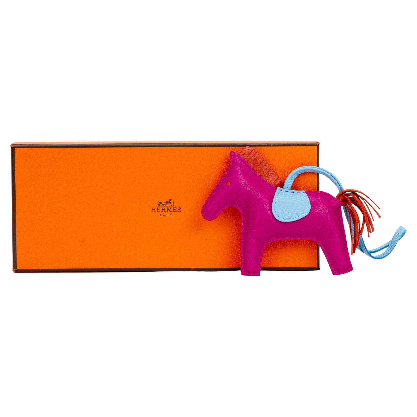 Hermes Rose Pourpre Rodeo Charm MM Lambskin Leather Pink: Hermes Rose Pourpre Rodeo Charm MM Lambskin Leather Pink The Hermes Rose Pourpre Rodeo Charm MM is a stunning accessory crafted from luxurious lambskin leather in a vibrant pink hue. This stylish char