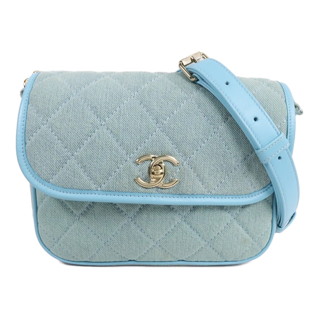 CHANEL CC Blue Denim Small Shoulder Messenger Bag: CHANEL CC Blue Denim Small Shoulder Messenger Bag Small blue Chanel CC messenger-style shoulder bag in denim with a turn-lock closure. This women's shoulder bag features an exterior open pocket and an