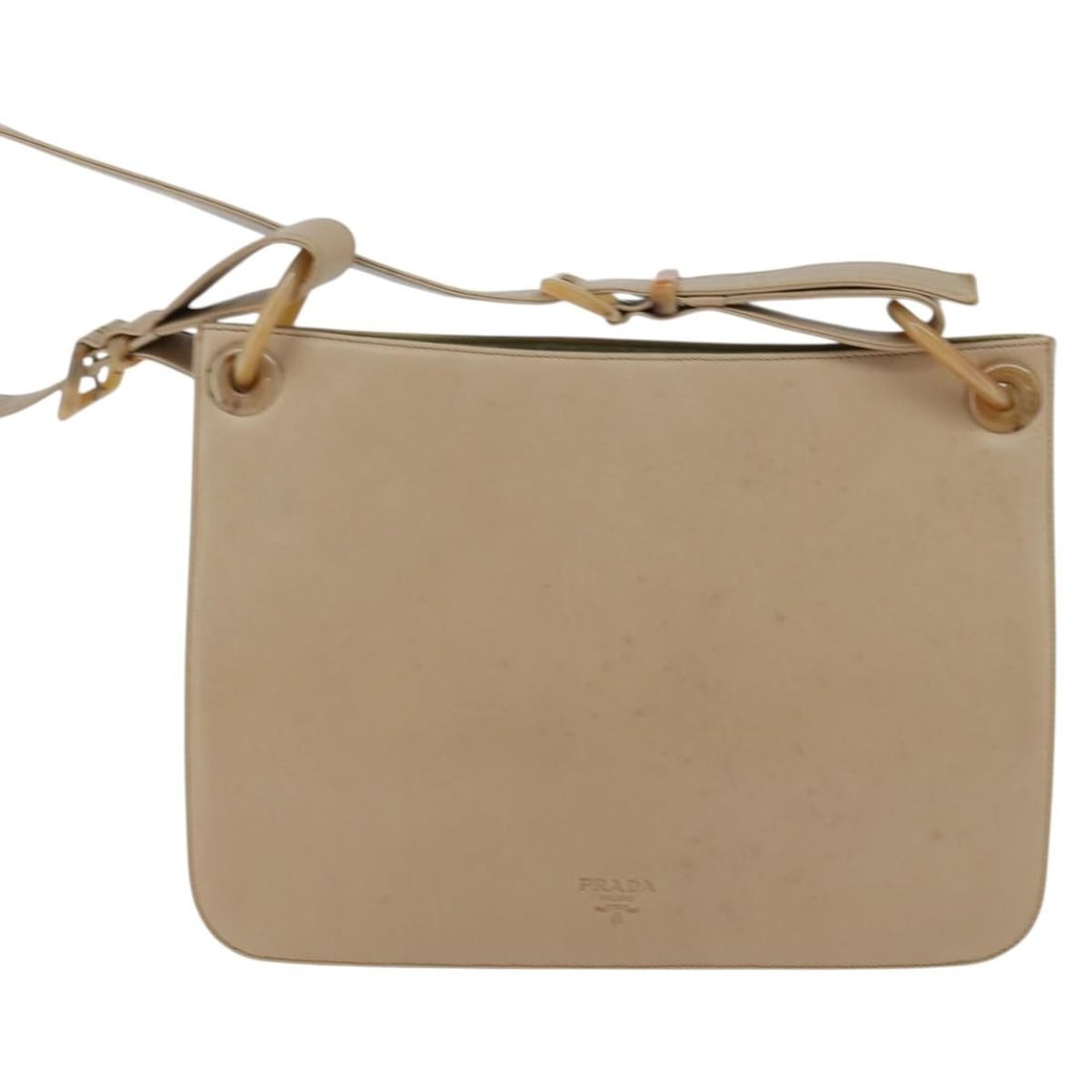 Prada Vintage Beige Leather Shoulder Bag: Prada Vintage Beige Leather Shoulder Bag This Prada vintage shoulder bag is crafted from beige leather and designed for women. It features a classic shoulder strap and metal fittings. The bag shows si
