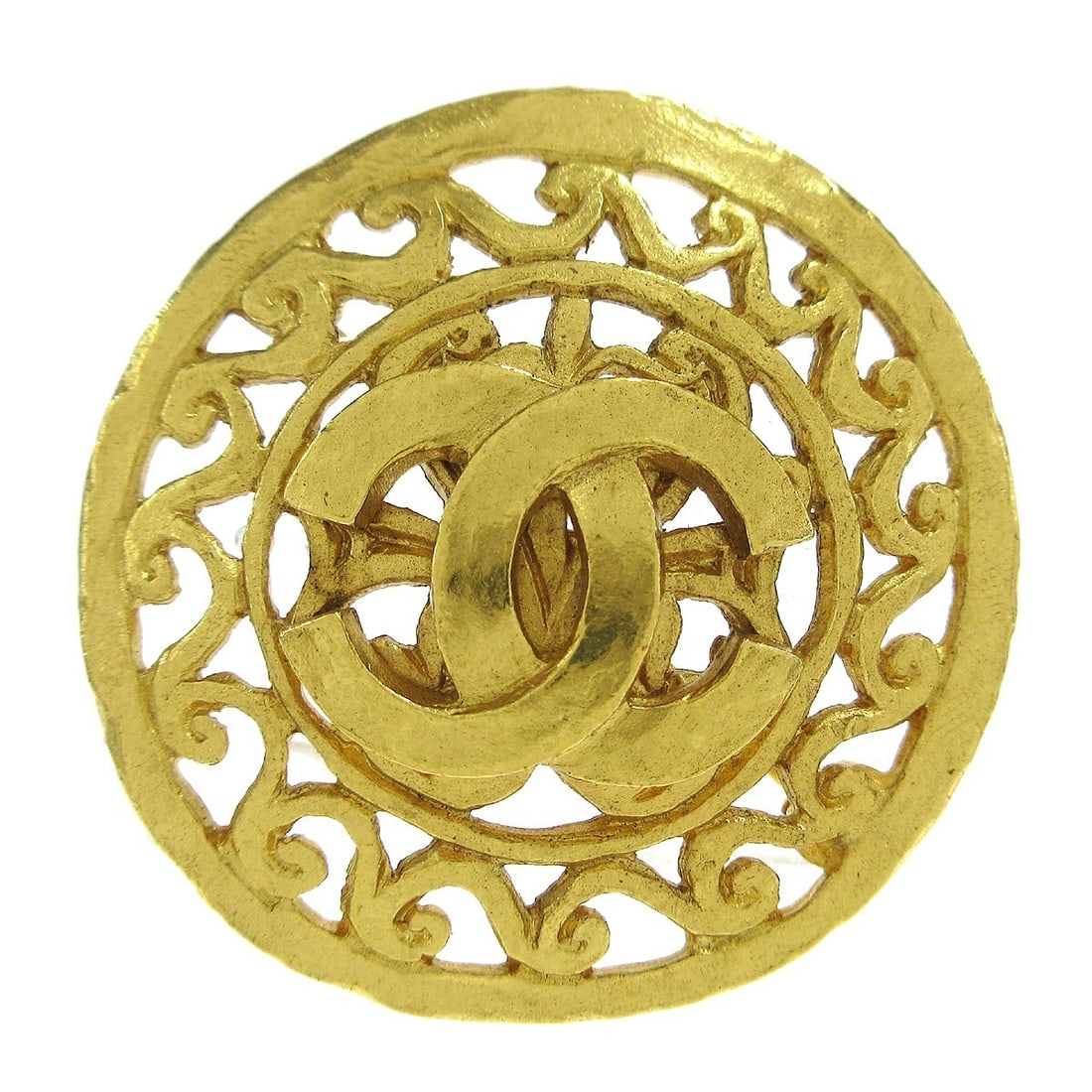CHANEL 95A Gold Plated CC Medallion Brooch: CHANEL 95A Gold Plated CC Medallion Brooch Round Chanel medallion brooch pin in gold-plated metal with the interlocking CC logo and a decorative medallion design. Made in France, this piece is marked 