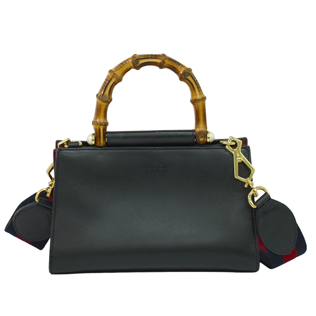 Gucci Nymphaea leather top handle bag black: Gucci Nymphaea leather top handle bag black Gucci Nymphaea Top Handle handbag in black leather. Made in Italy, this women's bag is presented in good condition with light wear and light marks to the ex