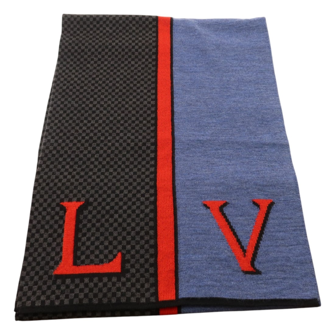 Louis Vuitton M70249 wool scarf muffler black blue red: Louis Vuitton M70249 wool scarf muffler black blue red Louis Vuitton wool scarf in a black, blue, and red colorway. This men's scarf is made in France and features model number M70249. Condition is AB