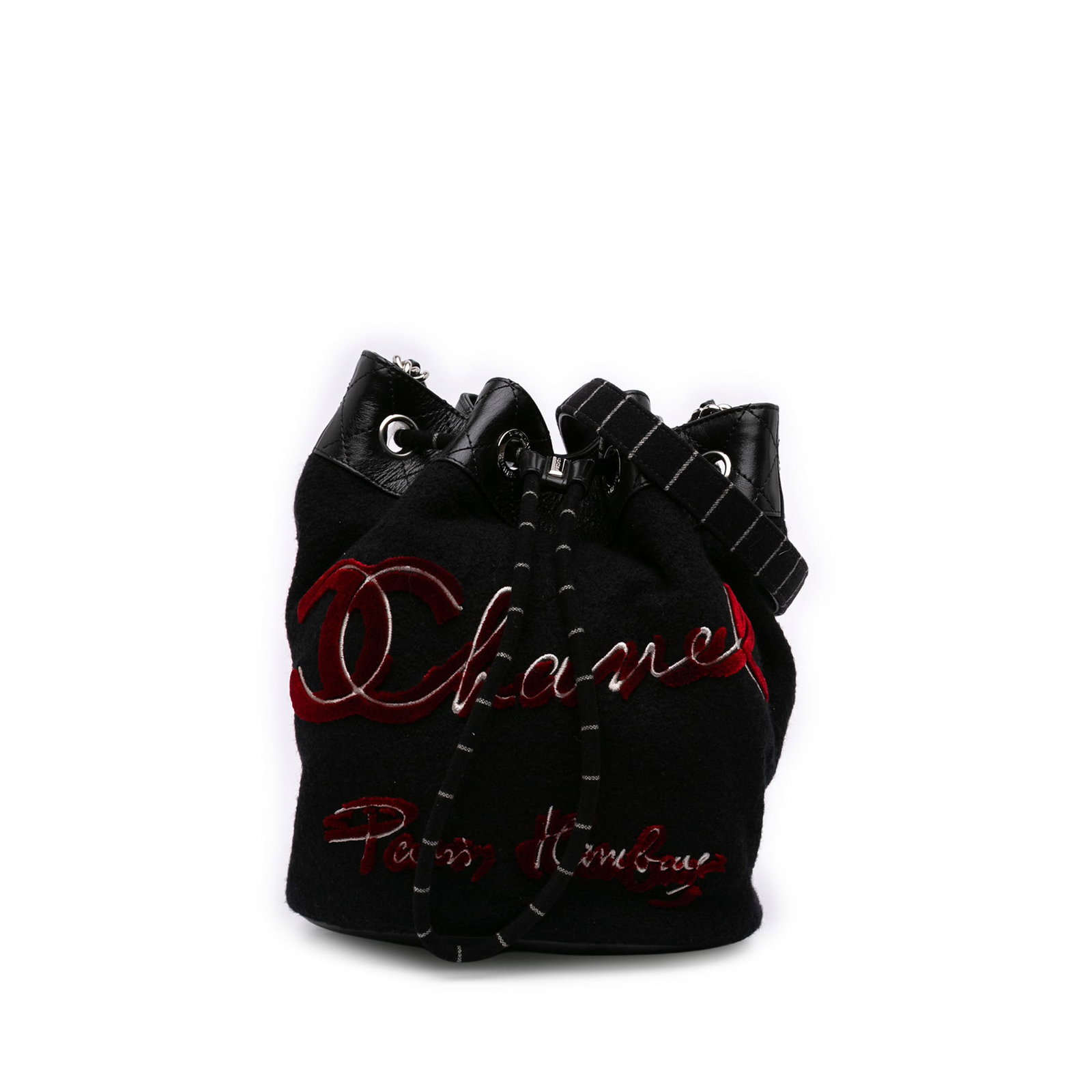 Chanel Paris Hamburg drawstring wool bucket bag with leather trim: Chanel Paris Hamburg drawstring wool bucket bag with leather trim Chanel Paris Hamburg Wool Bucket Bag in black, made in Italy. It features a wool body with lambskin leather trim, a leather woven shou