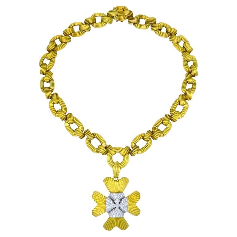 David Webb 18k Gold Platinum Sautoir Necklace with Diamond Maltese Cross Brooch: David Webb 18k Gold Platinum Sautoir Necklace with Diamond Maltese Cross Brooch Vintage David Webb sautoir necklace crafted in 18k yellow gold with platinum and diamond accents. It features a bold cha
