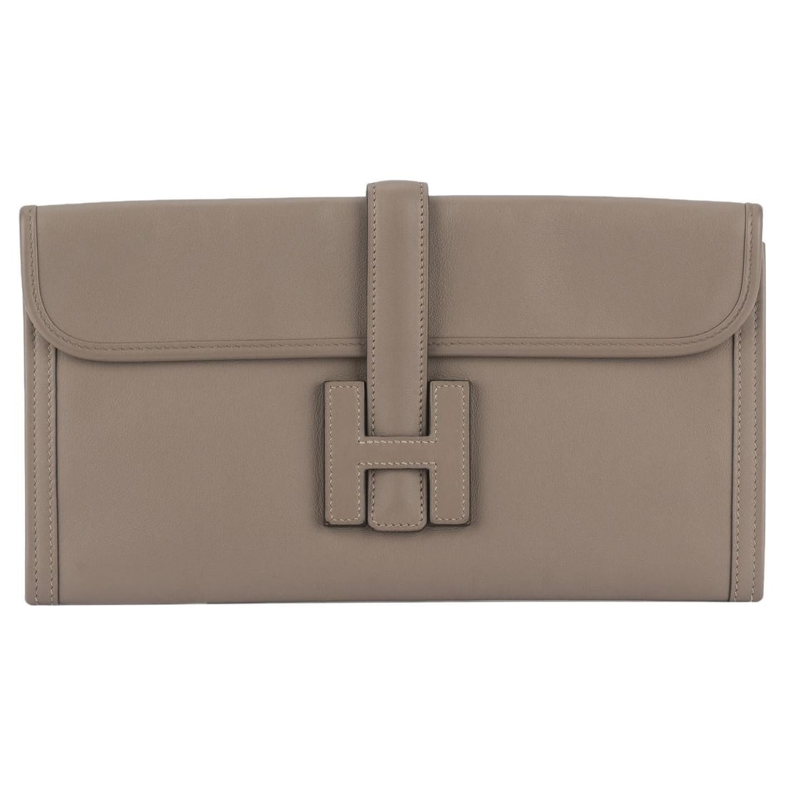 Hermes Swift Jige Elan 29 Clutch in Etoupe Leather with Dust Cover: Hermes Swift Jige Elan 29 Clutch in Etoupe Leather with Dust Cover The Hermes Swift Jige Elan 29 Clutch in Etoupe showcases a sophisticated design crafted from softly grained calfskin leather in a sty