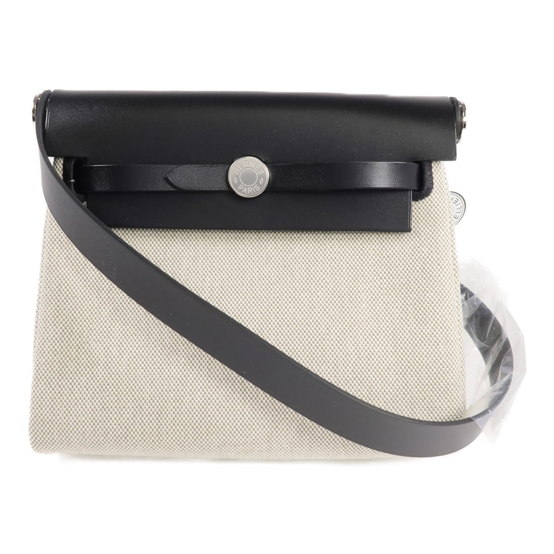 Hermes Mini Herbag Shoulder Bag Black Canvas Leather PHW: Hermes Mini Herbag Shoulder Bag Black Canvas Leather PHW A Mini Herbag shoulder bag in black from HERMES, crafted in canvas and leather. It features a shoulder bag style, black exterior color, and one
