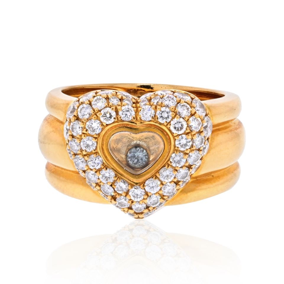Chopard 18K Yellow Gold Pave Heart Floating Diamond Ring 0.59cttw: Chopard 18K Yellow Gold Pave Heart Floating Diamond Ring 0.59cttw This exquisite vintage Chopard ring features a stunning heart-shaped design crafted from 18K yellow gold. The ring showcases a unique 